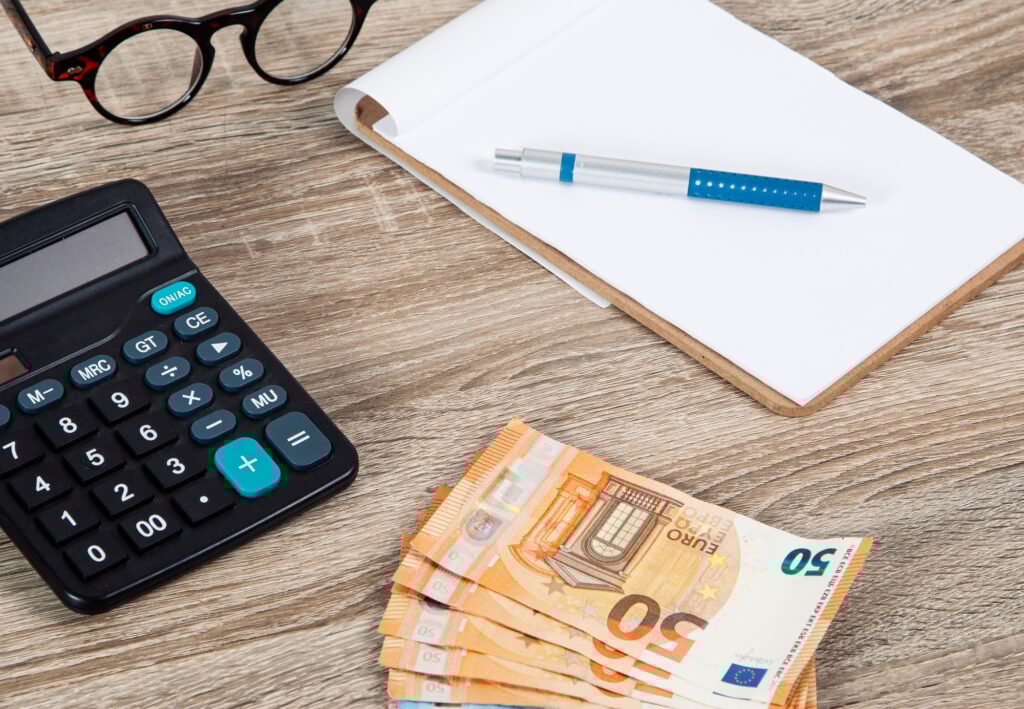 Banknotes and calculator, Euro banknotes, money, finances, taxes, benefits and costs, 50 euros